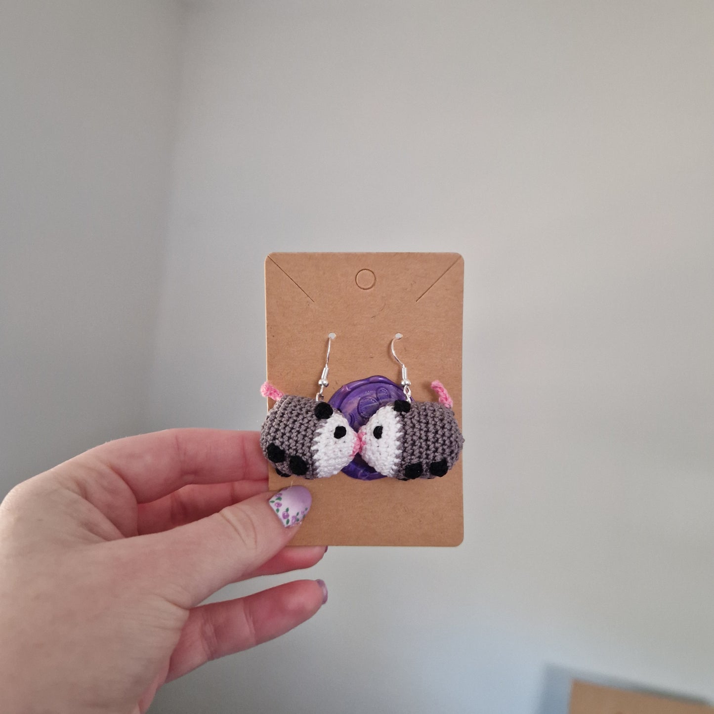 Big opossum microcrochet earrings