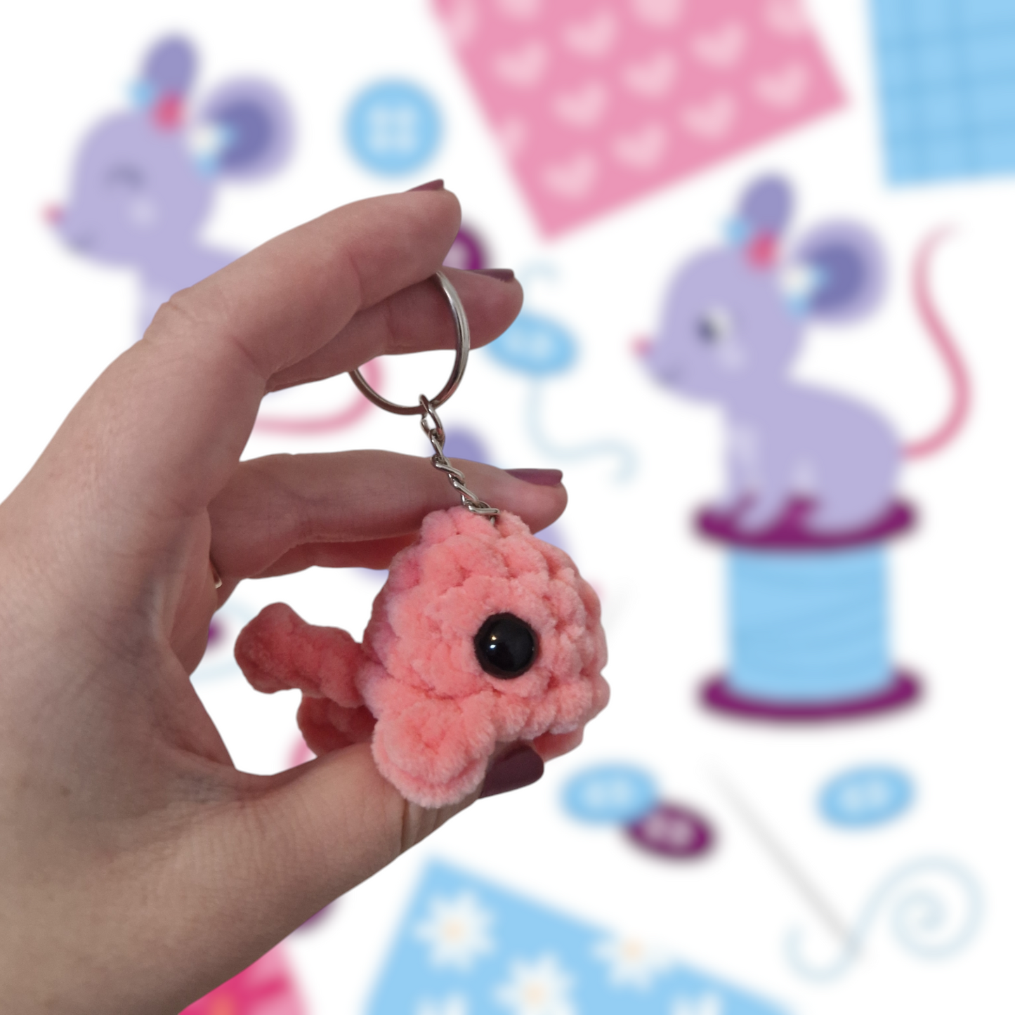 Bright salmon mini whale chenille yarn crochet keyring