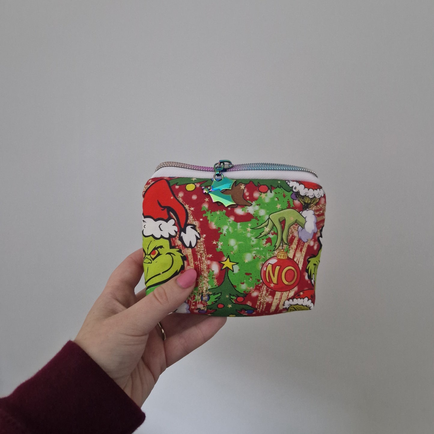 Mean One mini triangle shaped pouch cosmetic bag with zipper pull