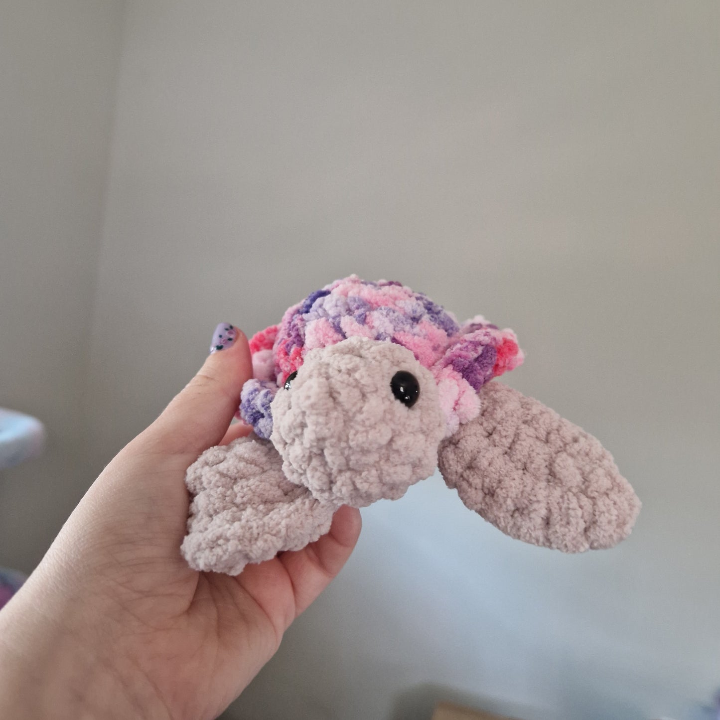 Pink variegated sea turtle small crochet plushie