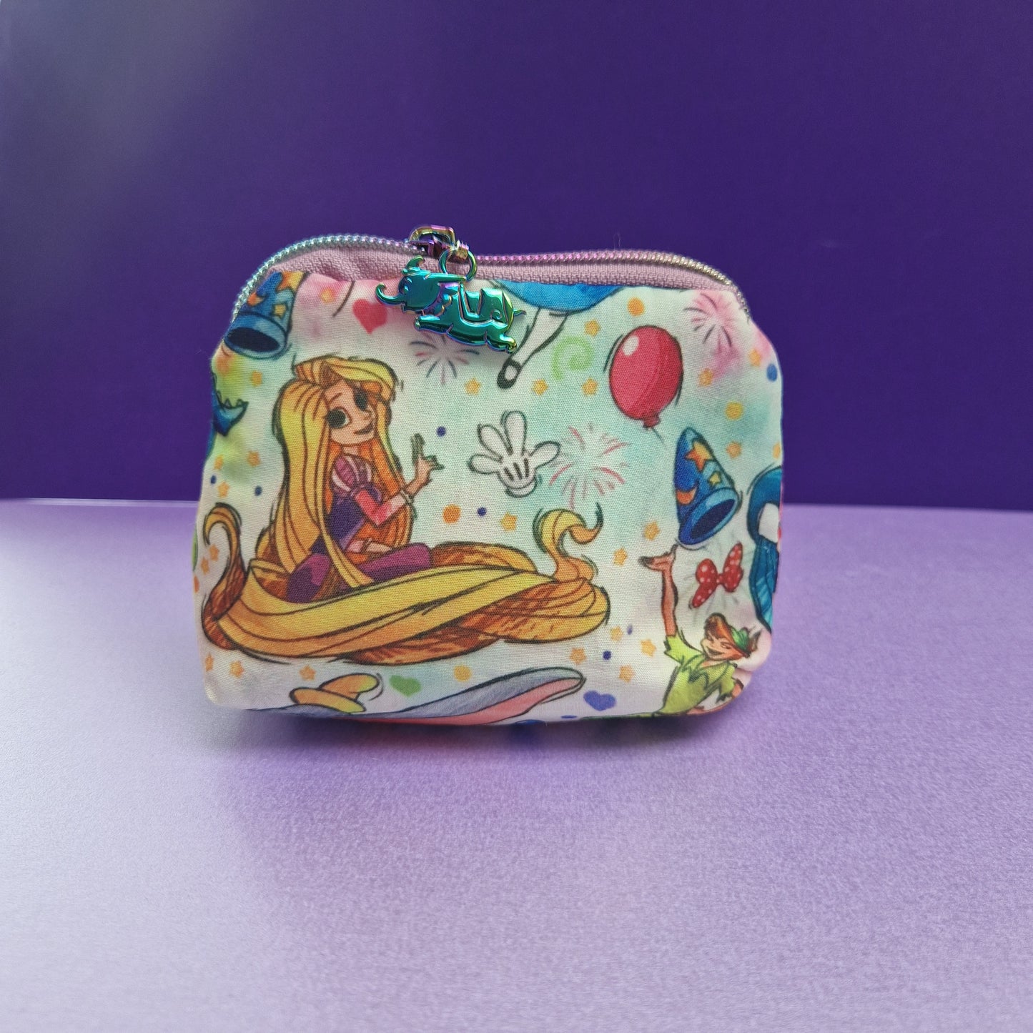 Mixed character mini triangle shaped pouch cosmetic bag with flying elephant zipper pull