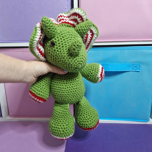 Green, red and white candy cane crochet dragon
