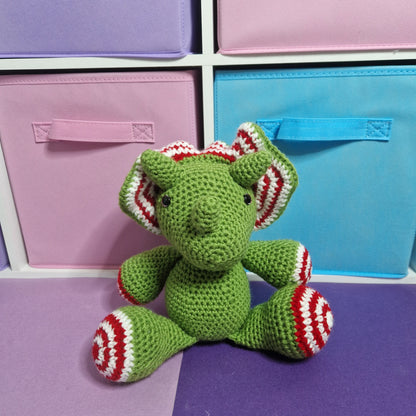 Green, red and white candy cane crochet dragon