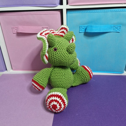 Green, red and white candy cane crochet dragon