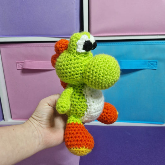 Green crochet dinosaur