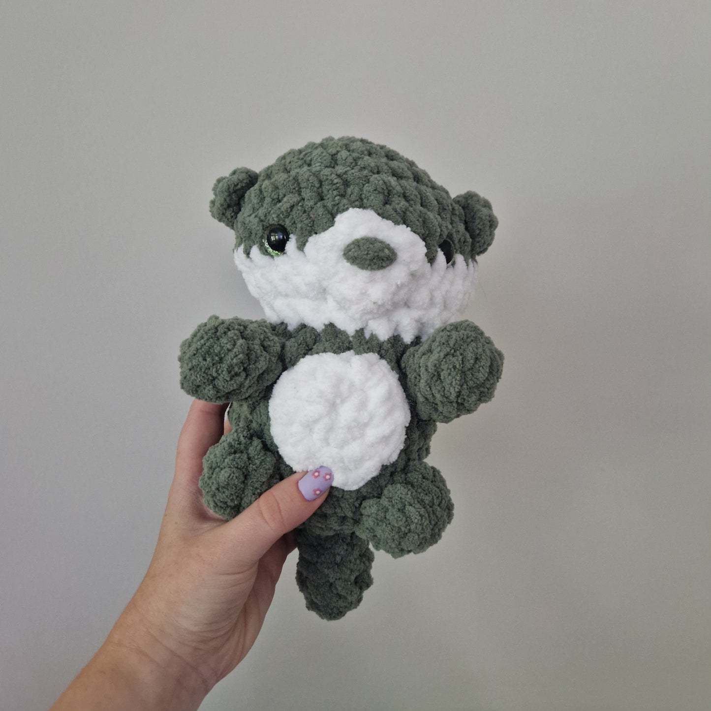 Green otter crochet plushie