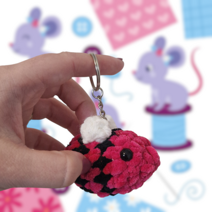 Bright pink bumble bee chenille yarn crochet keyring