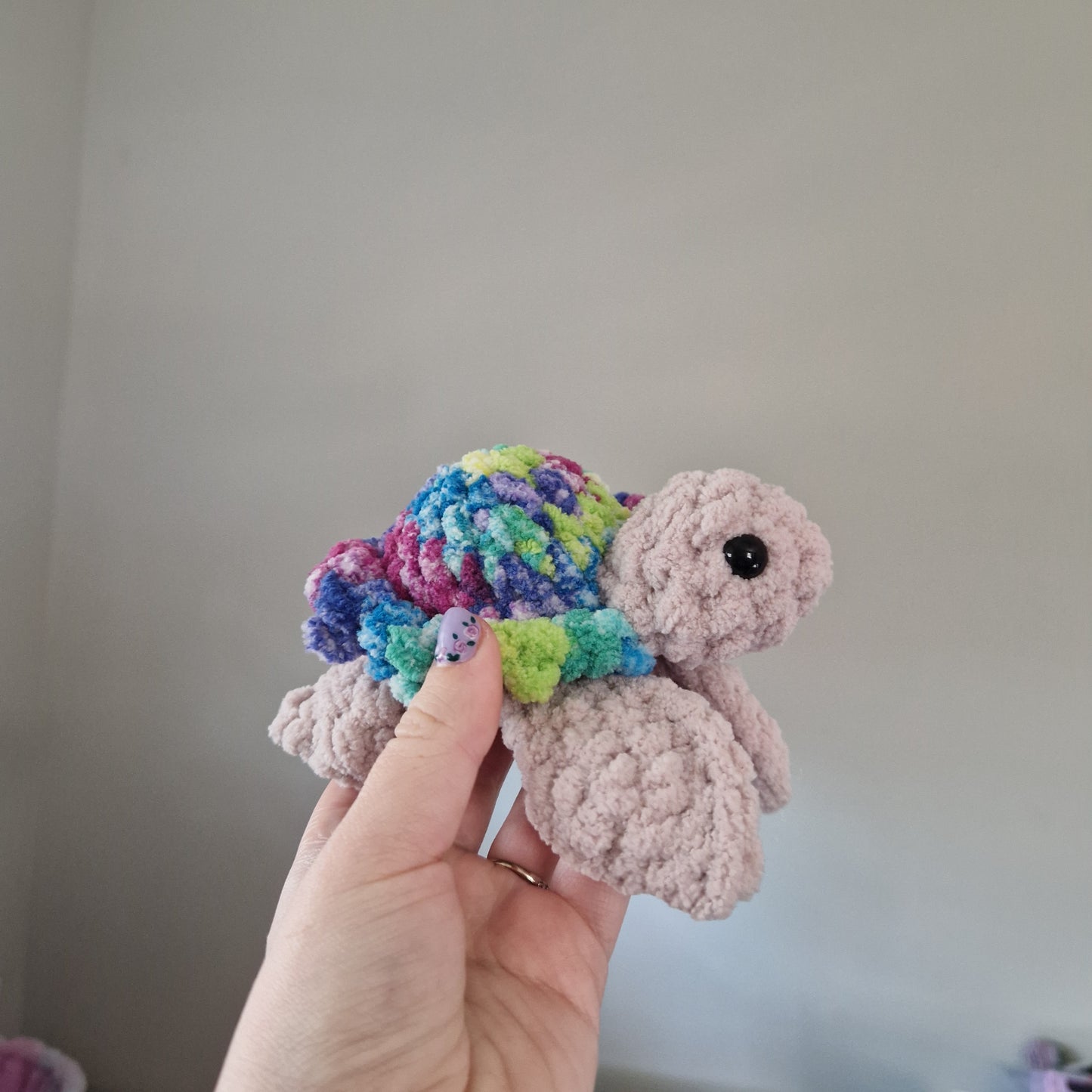 Green, pink, blue variegated sea turtle small crochet plushie