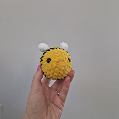 Bright yellow bumble bee crochet plushie