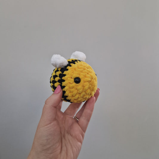 Bright yellow bumble bee crochet plushie