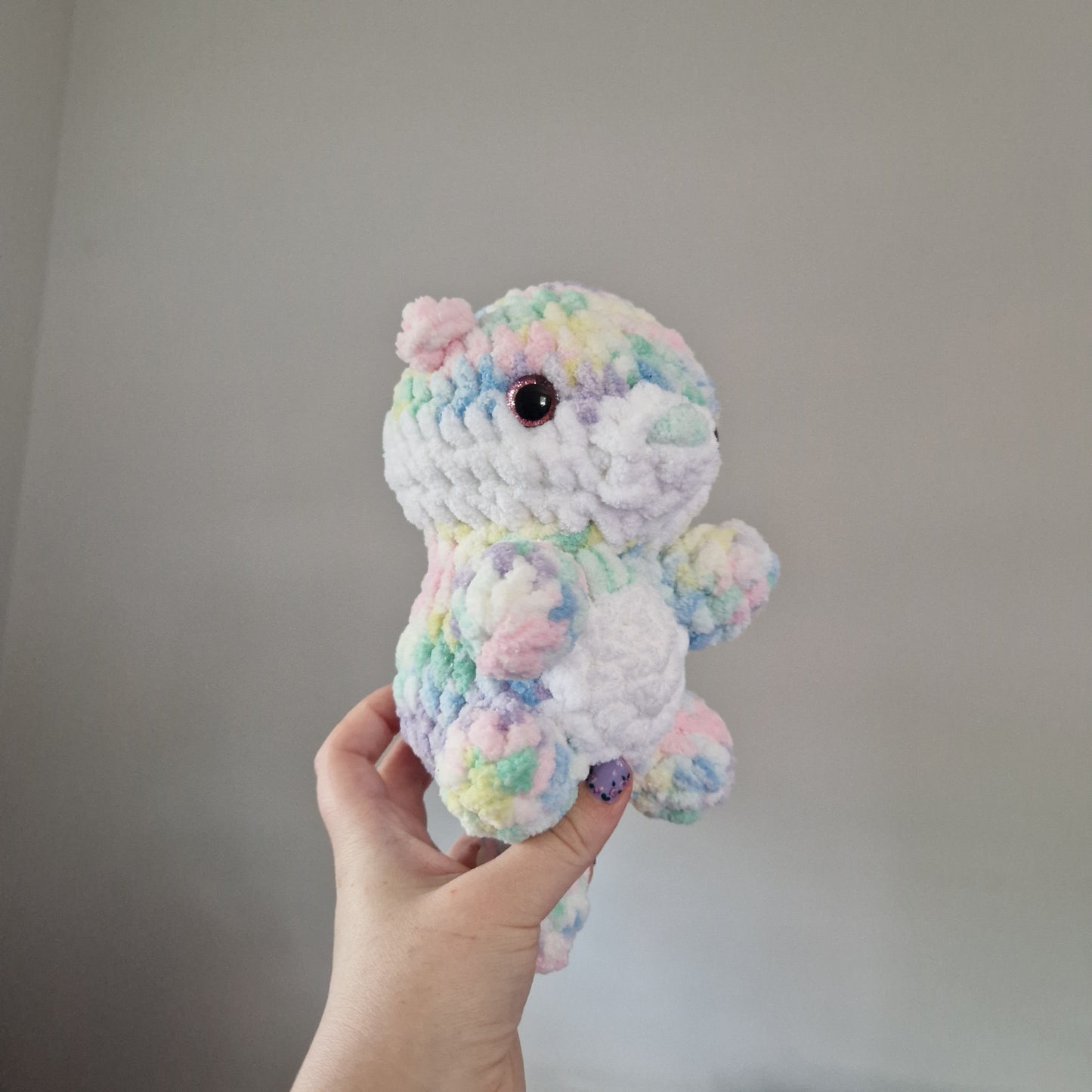 Pastel rainbow otter crochet plushie