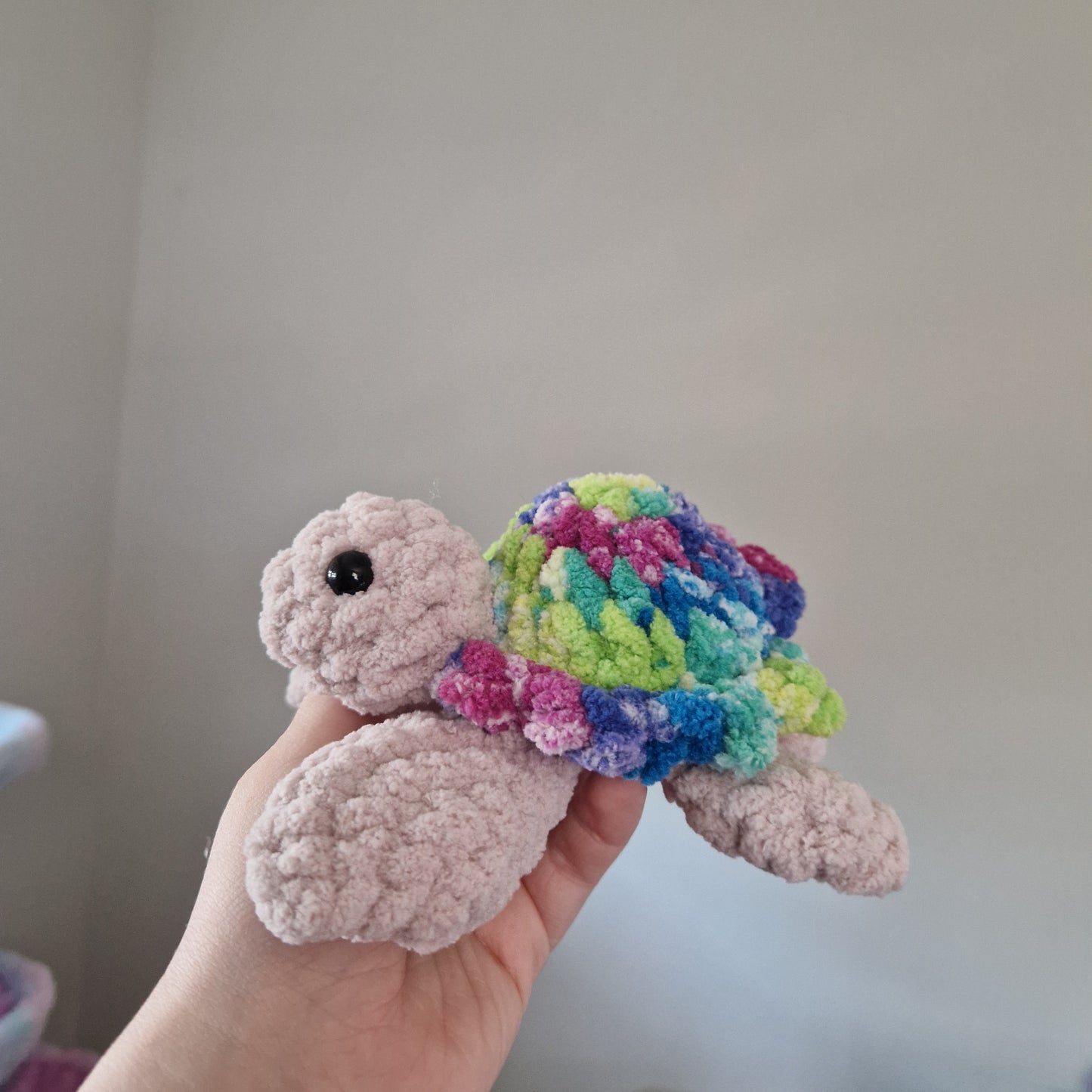 Green, pink, blue variegated sea turtle small crochet plushie
