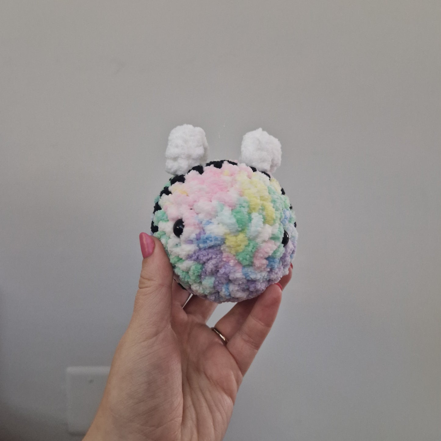 Pastel rainbow bumble bee crochet plushie
