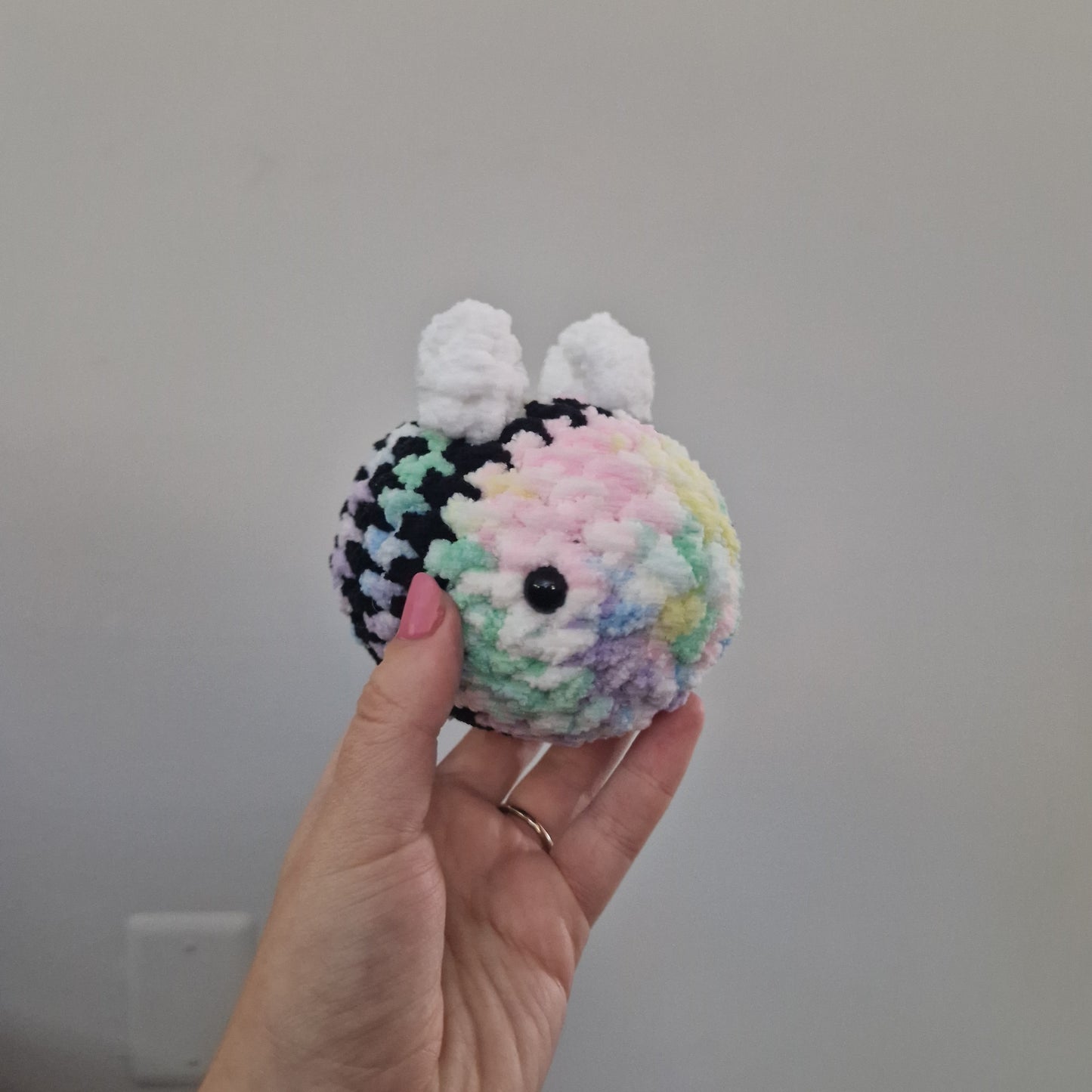 Pastel rainbow bumble bee crochet plushie