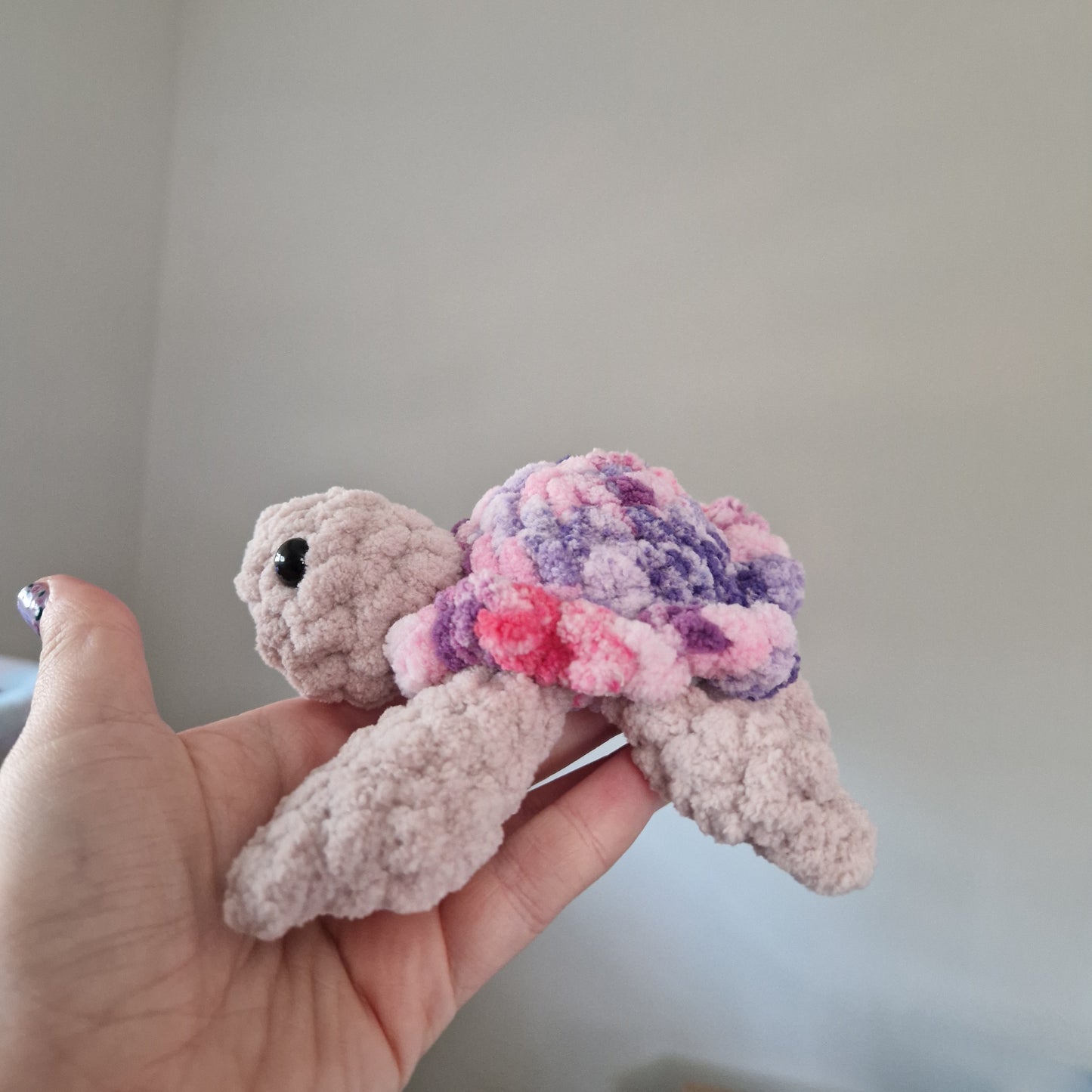 Pink variegated sea turtle small crochet plushie