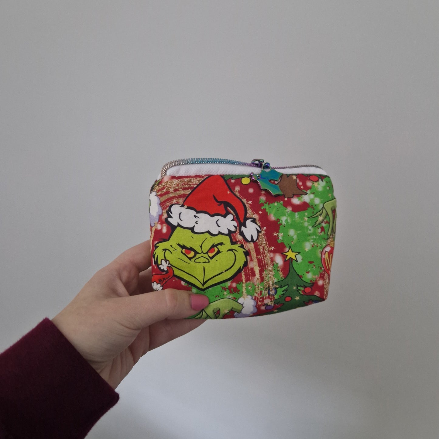 Mean One mini triangle shaped pouch cosmetic bag with zipper pull