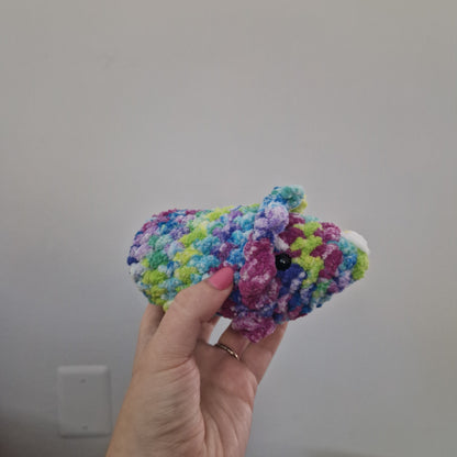 Green and pink triceratops crochet plushie