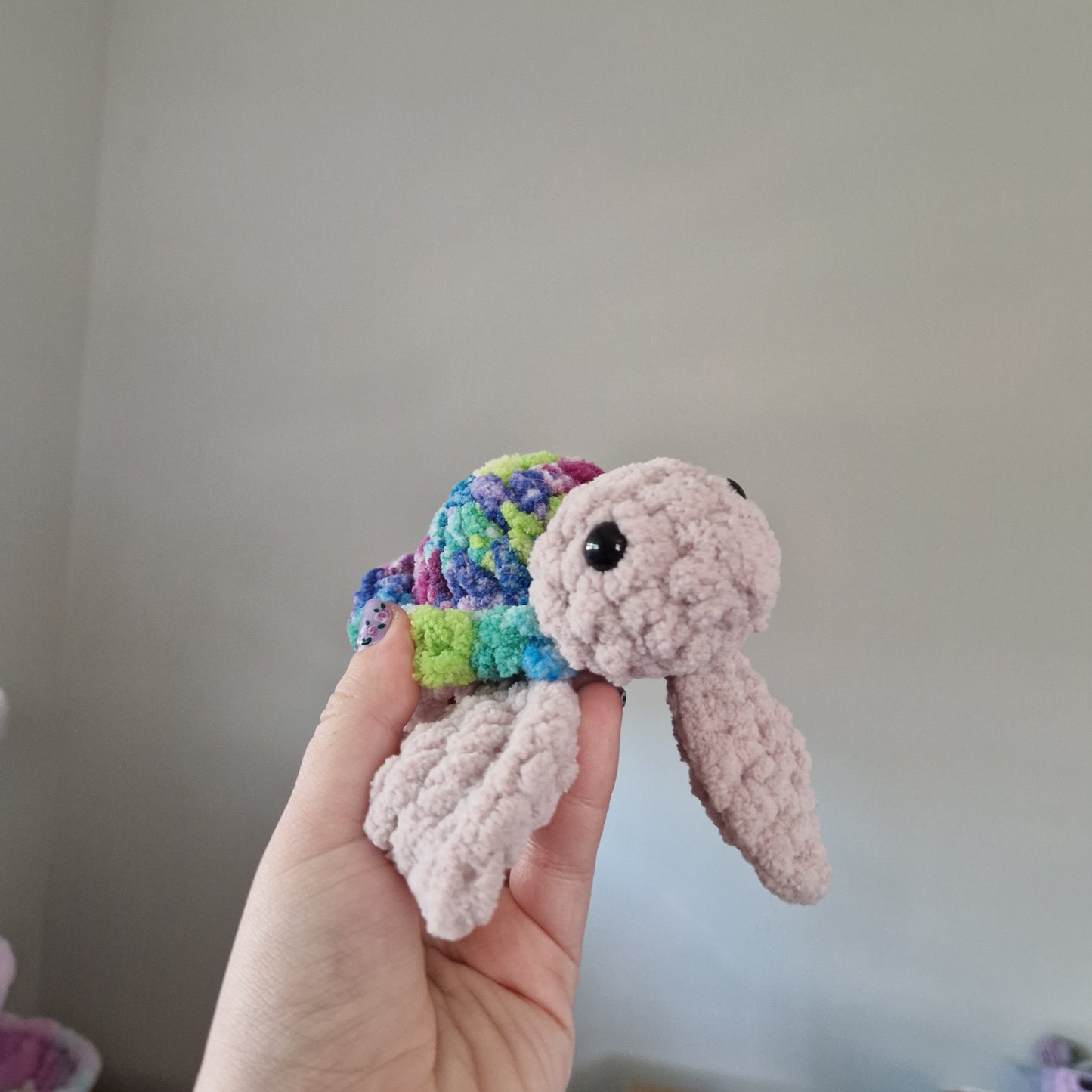 Green, pink, blue variegated sea turtle small crochet plushie