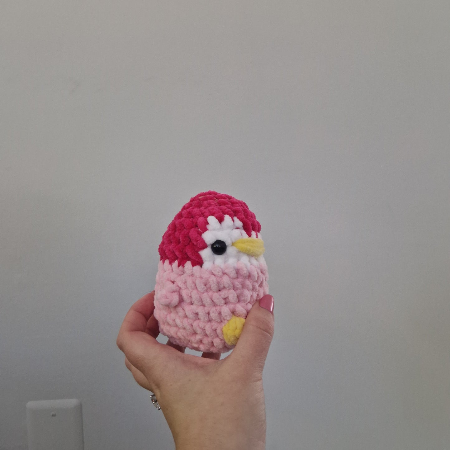 Pink penguin crochet plushie