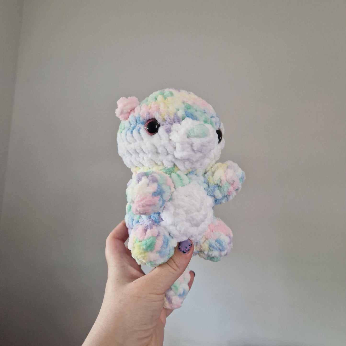 Pastel rainbow otter crochet plushie