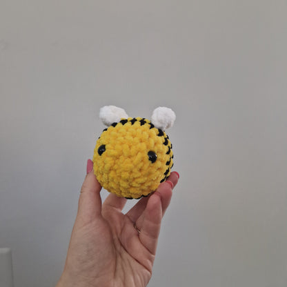 Bright yellow bumble bee crochet plushie