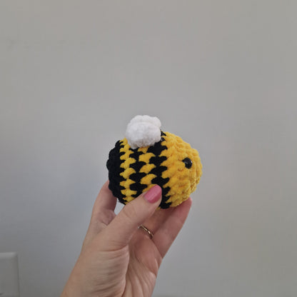 Bright yellow bumble bee crochet plushie