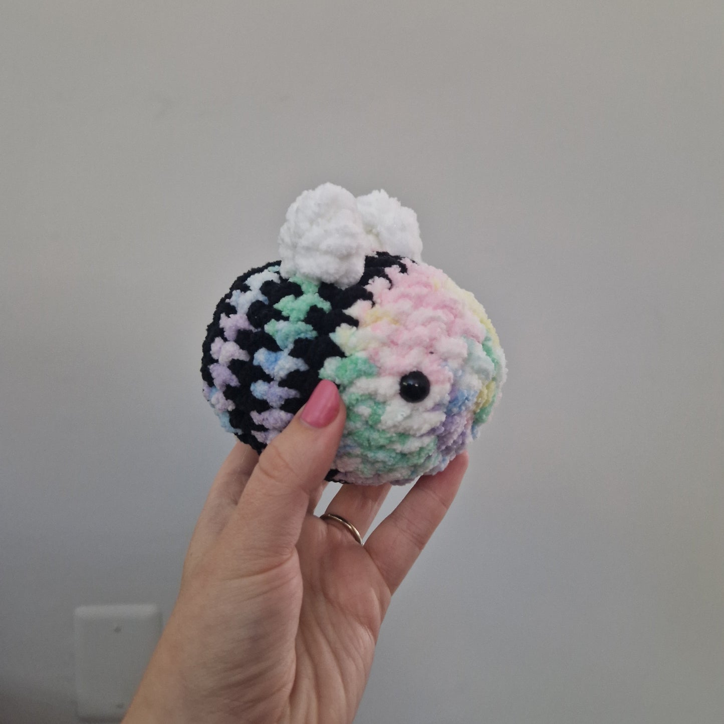 Pastel rainbow bumble bee crochet plushie