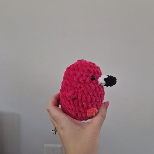 Bright pink flamingo crochet plushie