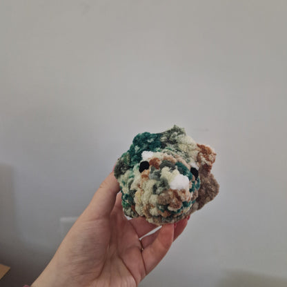 Brown and green triceratops crochet plushie