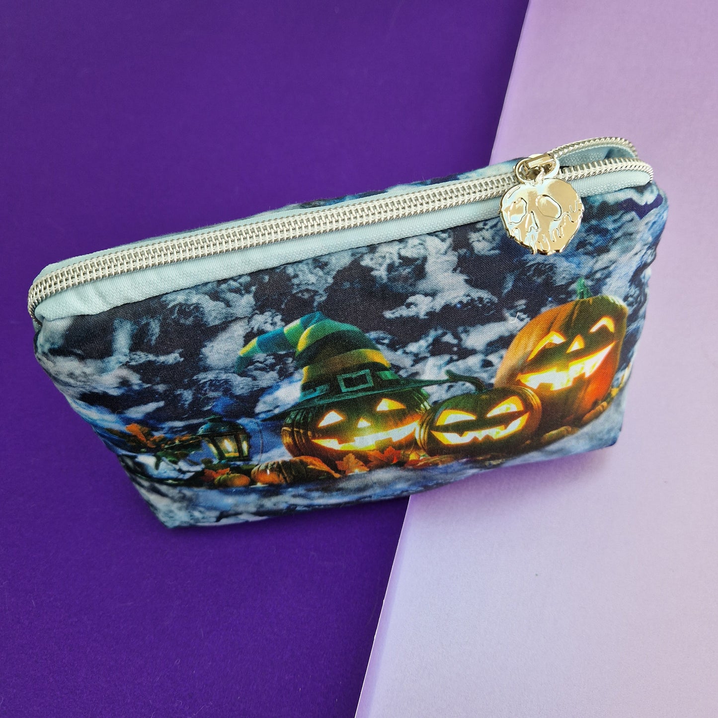 Spooky Pumpkin lined triangle cosmetic bag with zipper